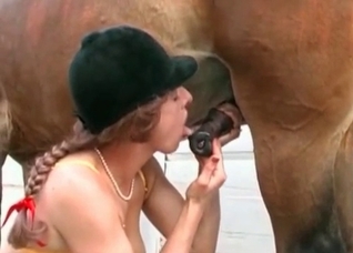 Two big-dicked horses fucking this horny slut